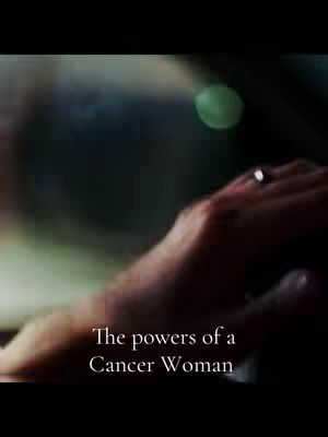 A dimly lit scene inside a car. The focus is on a hand, wearing a ring, resting on what appears to be a car window or door. The lighting is moody, with a blurred green light visible and text overlayed at the bottom.