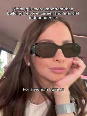 A woman with long brown hair and sunglasses sits, resting her chin on her hand. Overlay text is visible at the top and bottom.
