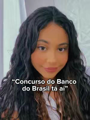 A woman with long, wavy dark hair, smiles at the camera. White text overlays, on a simple background.