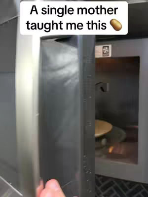 A close-up shot shows hands opening a microwave. Above the microwave is text with a potato emoji. The interior of the microwave is visible, with a plate inside.