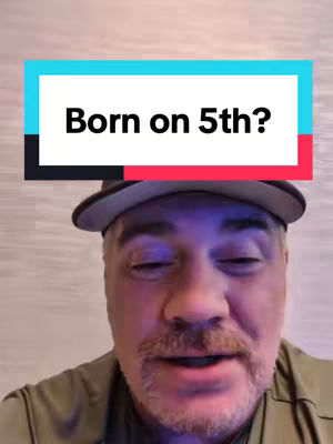 A man in a baseball cap looks at the camera. Above him is a text overlay, with the words 'Born on 5th?' in white lettering. The text is enclosed in a turquoise rectangle with a black border. The background appears to be an indoor setting with a light color.
