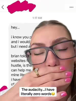 A selfie-style video cover image featuring a woman with glasses and a ring, covering her mouth with her hand. A text overlay, styled in a rectangular box, reads: "The audacity...I have literally zero words". A text message is partially visible in the background.