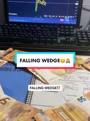 The cover image shows a desk setup with a laptop displaying a financial pattern. Below the laptop, a keyboard and stacks of Euro banknotes are visible. A notebook and documents are also present. Overlaid is a rectangular text banner with the phrase 'FALLING WEDGE' and an emoji.