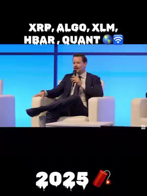 The cover image shows a man speaking into a microphone, seated on a white chair with a blue background. The text overlay at the top lists several cryptocurrencies, and the number '2025' is at the bottom with a dynamite emoji.