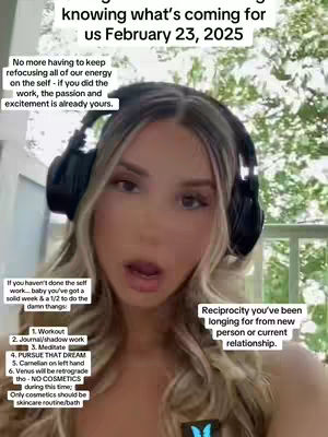 A woman with long blonde hair is centered in the frame. She is wearing headphones. Text overlays are placed around her, with one in the top-left corner and others in the bottom left and right. The background appears to be outdoors, with green foliage and a building visible.