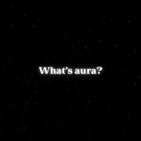 A black background is covered in small white dots that resemble stars. In the middle of the frame, the text 'What's aura?' is displayed in a bold, white font.