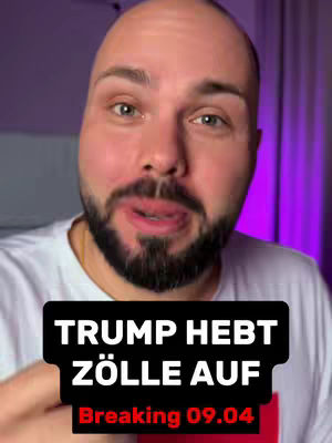 A man with a shaved head and a beard is centered in the cover image, looking directly at the viewer with a slight smile. He's wearing a white t-shirt, and the background features a mix of purple and white. A black rectangle overlay sits at the bottom, displaying the text 'TRUMP HEBT ZÖLLE AUF' in white, bold capital letters, and 'Breaking 09.04' in red below it.