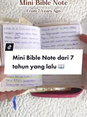 The cover image shows an open notebook with handwritten notes and highlights. A text overlay states "Mini Bible Note dari 7 tahun yang lalu." The layout is simple, with a focus on the notebook. The background looks like light-colored textile, and hand holding the notebook.