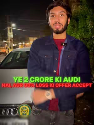The cover image shows a man standing in front of a white Audi at night. Text overlays are added in red and green. The man is wearing a blue jacket, red shirt, and is smiling.
