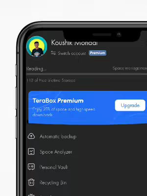 The image shows a close-up of a smartphone screen displaying the interface of the TeraBox cloud storage app. The phone is black, and the screen shows details about the account, storage, and app features. The app's interface has a dark theme, with various icons and text labels.
