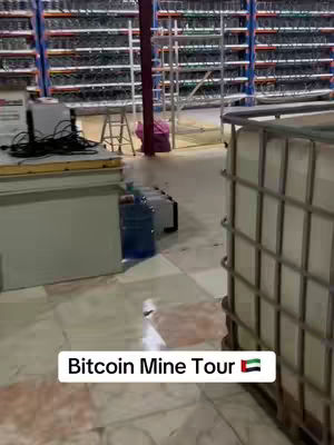 The cover image shows a view inside a Bitcoin mining facility. Rows of server racks filled with mining equipment are visible, suggesting a large-scale operation. The overall impression is of a high-tech, industrial setting.