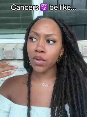 The cover image shows a close-up of a dark-skinned woman's face. She has long, dark locs. Overlayed text at the top reads, "Cancers ♋ be like..."