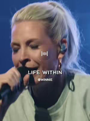 A close-up shot of a woman singing into a microphone. She has blonde hair pulled back in a ponytail. On the image is the text 'LIFE WITHIN' and the @Winnie handle. An equalizer graphic is also present.