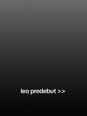 The image has a smooth, dark gradient background that transitions from top to bottom. In the lower portion, centered horizontally, there is white text that reads 'leo predebut >>'. The overall composition is simple and minimalist focusing on the textual message.