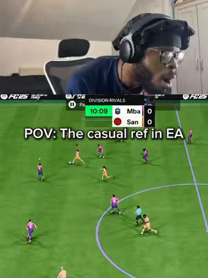 The cover image is a screen recording of a video game, "EA FC 25." In the top half of the frame, a man with glasses, a headset, and a black durag is positioned. His facial expression suggests he is reacting to the game. The bottom half of the image is a top-down view of the game itself, showing a soccer match in progress. Players are shown running on a green field. On the top panel, a gameplay time counter and score are visible.