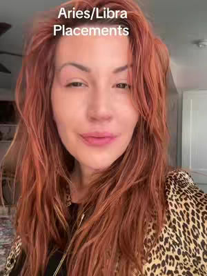 A woman with reddish hair and a leopard-print jacket is the main focus, with text overlayed at the top. The background suggests an indoor setting with neutral colors.