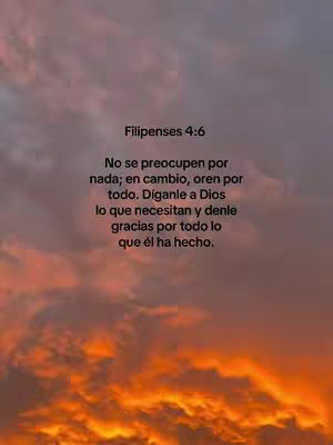 The image depicts a vibrant sunset or sunrise, with a gradient of colors ranging from deep orange and red at the bottom to lighter shades of pink and purple at the top. Overlaid on this colorful background is a quote from Philippians 4:6, written in a simple, readable font.