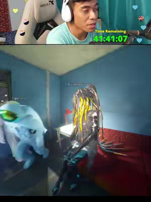 The cover image is split into two sections. The top half shows a young man wearing headphones, looking towards the right, with a green screen background. The bottom section depicts a scene from a video game with a digital character in a room and a strange blue creature.