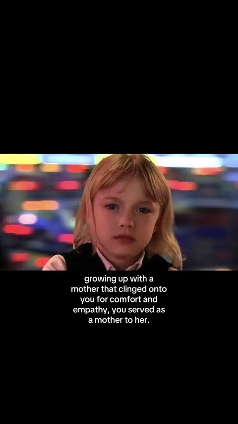The cover image features a young girl with blonde hair, looking towards the viewer with a somber expression. The background is a blurred mix of colors, likely from an illuminated area. A text overlay at the bottom offers the premise: 'growing up with a mother that clinged onto you for comfort and empathy, you served as a mother to her.'