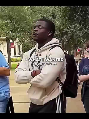 The cover image shows a young Black man with short hair, wearing a light gray hoodie with a black backpack. He is standing outside. The background is slightly blurred. The text overlaid on the image says, "-WHAT I WANTED @JESUSISKING.IVA".