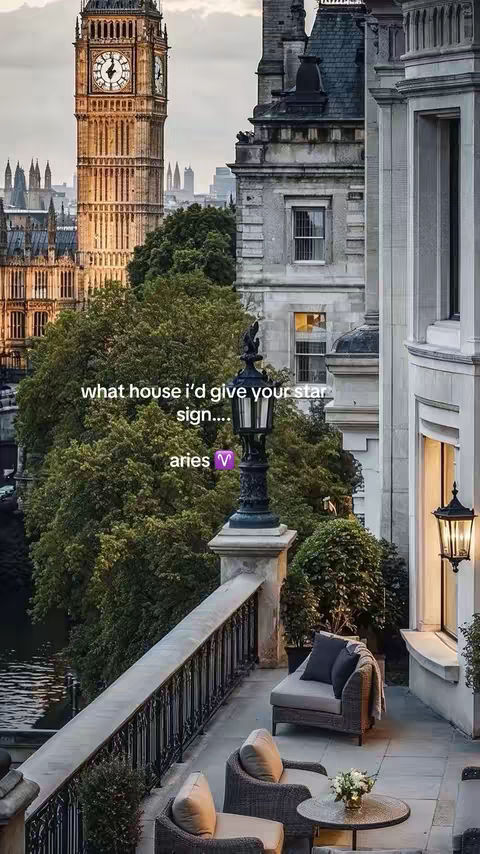 An exterior shot of a building with a balcony and cityscape. Big Ben is in the background, to the left, The balcony in the foreground has two chairs, a table, and a railing, with text overlays.