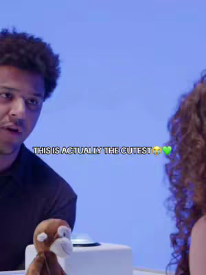 The cover image shows a man on the left looking at the camera, with the woman on the right, blurred in the background. The text overlay, in a white font, is positioned at the bottom