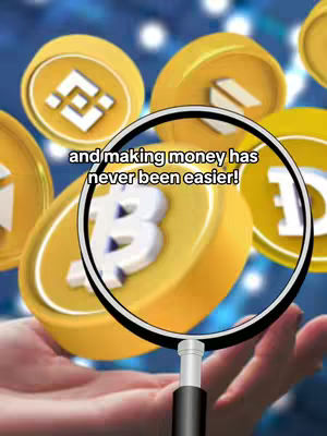 The image shows a close-up of a hand holding a magnifying glass, with the lens focused on a cluster of stylized gold coins. The coins feature various cryptocurrency symbols, including Bitcoin, Binance, and Dogecoin. The background has a blurred, gradient blue effect. Text is overlaid in white over the magnified area, and the overall composition suggests a focus on cryptocurrency and financial growth.