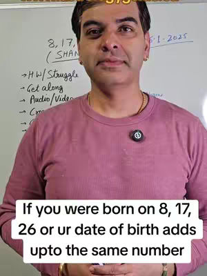 A man in a pink shirt stands in front of a whiteboard with handwritten notes on the left, a date on the right, and the video's hook beneath him. A black pin is visible in the center of the shirt. The overall composition is straightforward, emphasizing the man and the overlaid text against a neutral background.