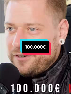 The cover image features a man with a beard and ear gauges, close up, speaking into a microphone. There is an overlay with a highlighted monetary value.