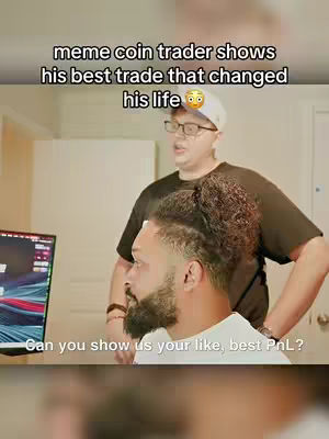 The cover image shows two men inside on a neutral background with a computer screen. The person in the background is taller, wears glasses and a ball cap. The other man with a beard is looking off to the side. Text overlays read "meme coin trader shows his best trade that changed his life" and "Can you show us your like, best PnL?"