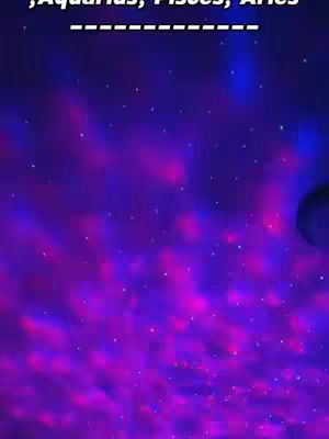 The image displays a vibrant, cosmic scene with a purple and blue color scheme. Streaks and spots of pink and white appear as if stars or nebulas. At the top, there's a text overlay with white text on a dashed line.