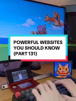 The image shows a person's hands typing on a keyboard. In the background, a large monitor displays a scene from the Pokemon game. Additional elements include a Nintendo 3DS, a pixel art display, and various items on the desk. The image presents a tech setup with a gaming and productivity theme.