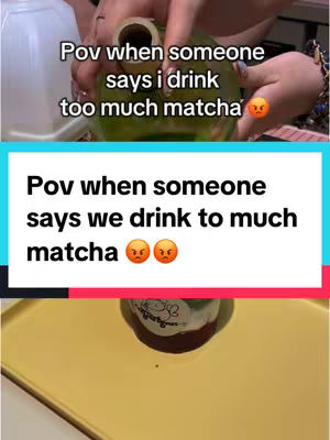 The cover image shows a split screen effect. At the top, is a point-of-view shot of someone pouring matcha into a cup that is placed on a gold tray. Text overlayed says, "Pov when someone says I drink too much matcha" and has an angry emoji. The bottom half, also has text overlayed and says, "Pov when someone says we drink to much matcha," with two angry emojis in a row. The cup has some sort of design printed on it.