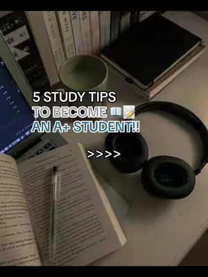 A top-down shot displays a desk setup with study materials. A laptop displaying a screen is on the left, with books and a mug in the background. In the center, an open book and pen are visible, Headphones are to the right. The background has a muted color scheme.