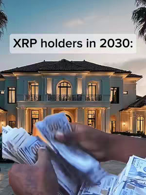 The cover image shows a large, luxurious house with a grand facade. In the foreground, a pair of hands is holding and displaying a large amount of money, likely hundred-dollar bills. The background shows a blue sky with some palm trees on both sides, giving a sense of wealth, success, and a tropical lifestyle.