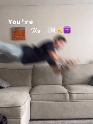 A man appears to be diving onto a couch, with text overlays and emojis indicating a message.