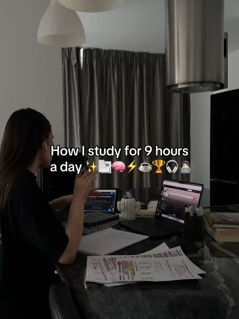 A woman is seated at a kitchen counter, working on a laptop with notes and papers spread out. Text overlays the image, indicating it's about study tips. The setting includes kitchen appliances and decor. The overall lighting is bright, creating a clean, modern feel.