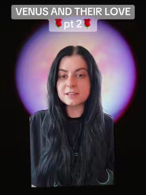 A woman with long black hair in a black top is centered in the frame, smiling gently at the viewer. Behind her is a dark background with a large, blurred purple-pink circle, giving way to a dark black.