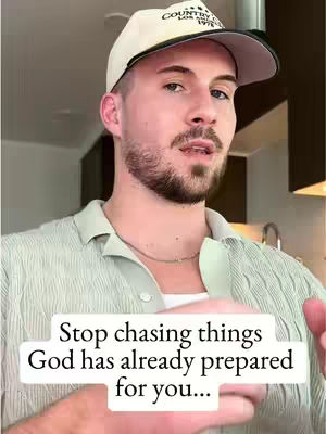 A man wearing a baseball cap and a light green button-down shirt is the focus of the shot. Overlayed on the image is a white background with black text that reads: “Stop chasing things God has already prepared for you…”. The background appears to be a home.