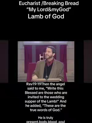 A person in a suit talks in front of a small crowd. The background is a muted church image. The overlay reads: Eucharist / Breaking Bread, "My Lord&myGod", Lamb of God, a bible verse and "He is truly present.body.blood.soul."