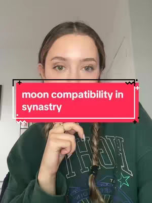 A woman with braided hair and a dark green sweatshirt, holding a finger up, with a red banner that reads, "moon compatibility in synastry".