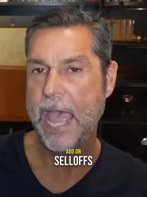 A man with graying hair and a beard is speaking directly into the camera with an open mouth. Text overlays are added to the image.