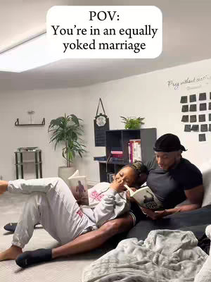 A couple seated on a couch reading books in a living room setting. The woman is leaning against the man, with a white overlay at the top with text.