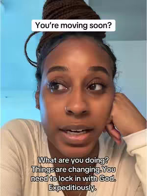 A close-up shot features a young woman with dark hair styled in a braided bun, her expression a mix of concern and emotion. The background appears to be a neutral-colored wall. Text overlays are added at the top and bottom.