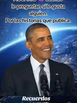 The cover image features Barack Obama, smiling and speaking at a podium. Above him is overlaid text in white, set against a blurred background of a blue world. At the bottom, there is another white text overlay.