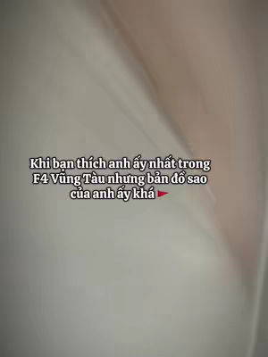 The image has a blurred, abstract background that seems to be white or cream-colored. Overlaid is text in black, centered and vertically aligned in the middle of the image. The text is a mix of Vietnamese and English (likely due to the hashtags).