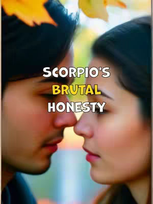 The image shows two people, a man and a woman, facing each other in a close-up shot. The man is on the left, with his dark hair and a slight shadow of a beard visible. The woman is on the right, with her hair out of focus. Their faces are close together, almost touching at the noses. The background is blurred, with hints of yellow and orange, suggesting autumn leaves.