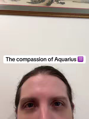 The cover image shows the top of a person's head and face, with the text overlayed. In the background are a plain, off-white wall and decorative framed artwork.