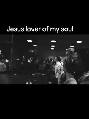A black and white image of what appears to be a music performance with a crowd. The text overlay reads Jesus lover of my soul.