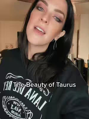 A woman with long dark hair and light skin is looking slightly up and to the left, with visible makeup and earrings. Text overlays the frame with the video title.